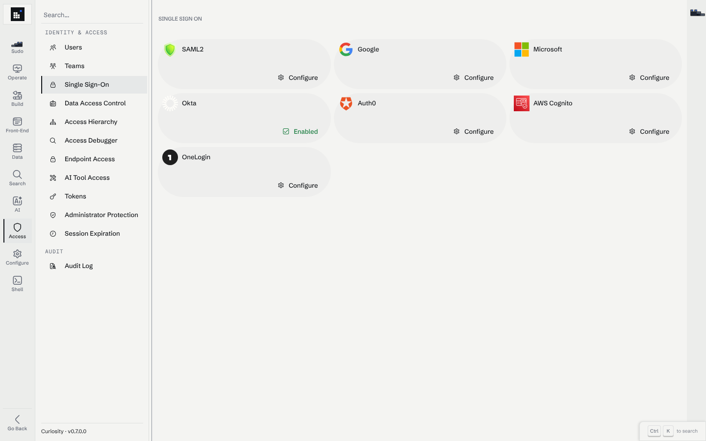 The Single Sign-On page with one card per provider: SAML2, Google, Microsoft, Okta (Enabled), Auth0, AWS Cognito and OneLogin.